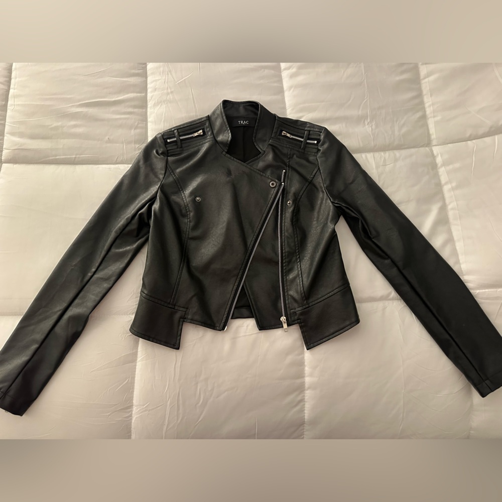 Trac Women’s Black Leather Jacket NWOT with silver zippers